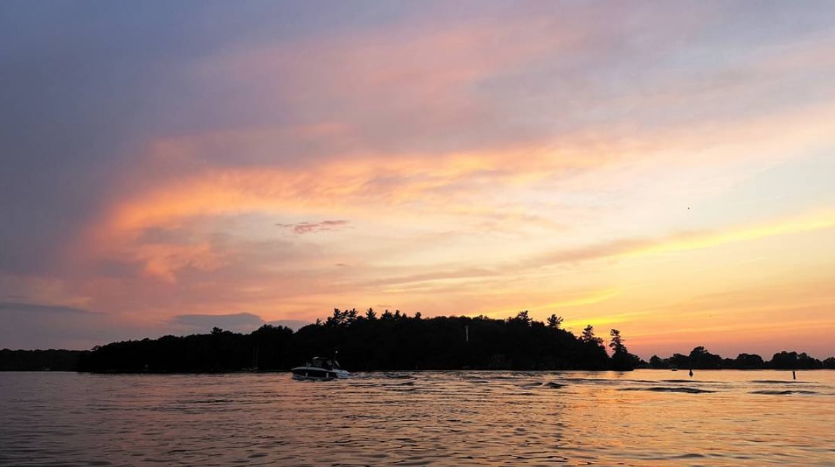 island silhouette on the big rideau lake in Ontario at sunset